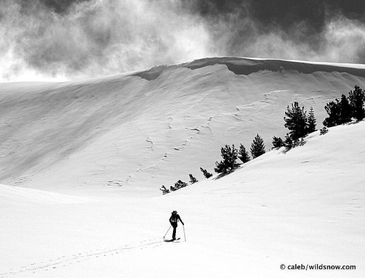 Wind and clouds moved in and out as Mr. Wildsnow searches for the cold snow.