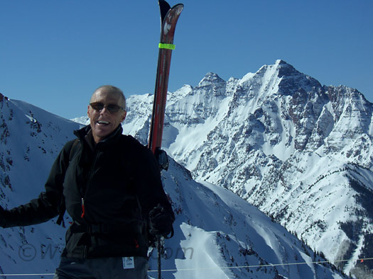 Peter Kelley at Highlands summit with Pyramid Peak