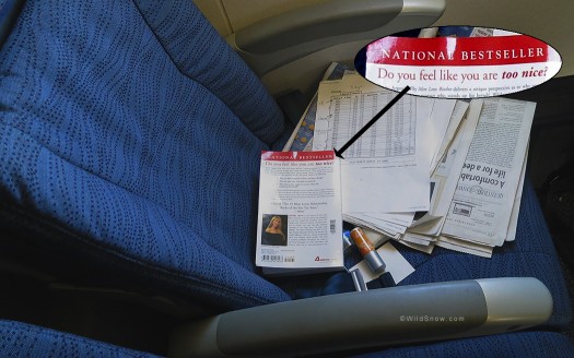 One of our flights last winter. The attendant was gruff. Then I noticed what she was reading. Hah! One of our flights last winter. The attendant was gruff. Then I noticed what she was reading. Hah!
