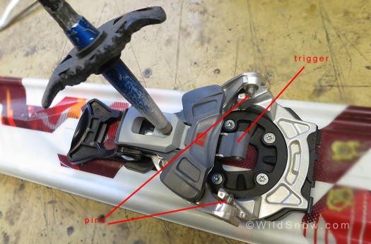 To enter or exit Beast ski binding, press the opener tab down with a ski pole tip or with your hand.