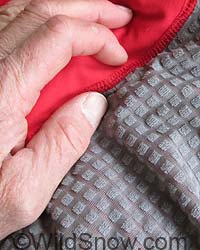 Waffle insulation is bonded to the wind resistant nylon.