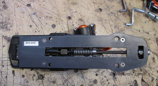 Underside shows the spring loading machinery. For most ski tourers this is a solution without a problem, but in the case of aggressive freeride it probably helps when your ski flexes and your boot heel encounters the heel unit (something has to give.) Underside shows the spring loading machinery. For most ski tourers this is a solution without a problem (original tech binding system has intelligent pins that slide in and out of the boot heel), but in the case of aggressive freeride it probably helps when your ski flexes and your boot heel encounters the heel unit (something has to give.)