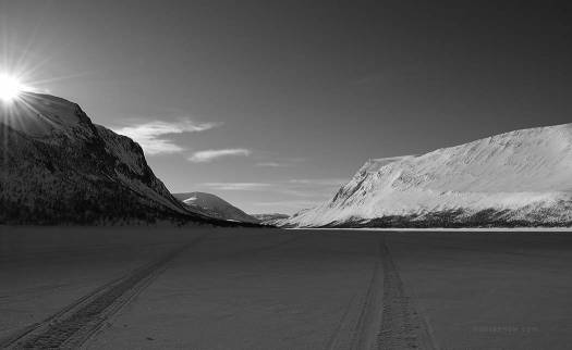 Picture6_LakeTuesajaure_B_W copy A view from the lake a Tuesajaure. The cabins can also be accessed by snowmobile by taking a much longer route around the national park.