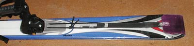 Some bindings may have a trick way of attaching the bungie cord loop. These shots of the Fritschi Diamir Freeride show a convenient little notch that's molded into the plastic mounting plate under the heel unit. Who knows what this is intended for, but it works great as a place for the rat to curl his tail. Skin below overlaps over tail, not as good as cutting short as shown elsewhere in this article, but it still works and allows longer skins to be used with shorter skis. Some bindings may have a trick way of attaching the bungie cord loop. This shot of Fritschi Diamir Freeride shows a convenient little notch that's molded into the plastic mounting plate under the heel unit. Who knows what this is intended for, but it works great as a place for the rat to curl his tail. Skin below overlaps over tail, not as good as cutting short as shown elsewhere in this article, but it still works and allows longer skins to be used with shorter skis.