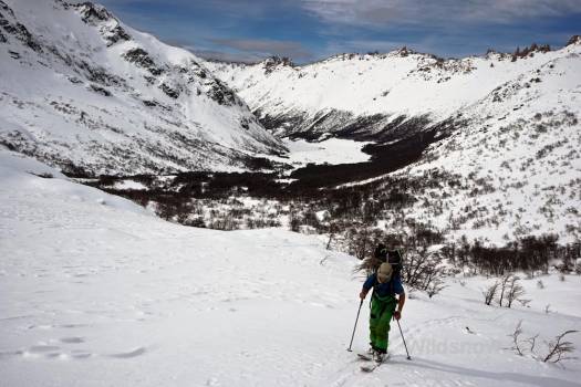 Coop skinning up Ruco Valley. Back sides of Frey spires are visible on the distant ridge. The terrain changes dramatically once out of the Frey basin. Coop skinning up Ruco Valley. Back sides of Frey spires are visible on the distant ridge. The terrain changes dramatically once out of the Frey basin.