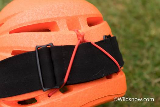 Detail of the elastic designed for securing a headlamp. Works well for ski goggles as well. Crucially, it's also quick and easy to operate with one hand while the helmet's on your head. Detail of the elastic designed for securing a headlamp. Works great for ski goggles as well. Crucially, it's also quick and easy to operate with one hand while the helmet's on your head.
