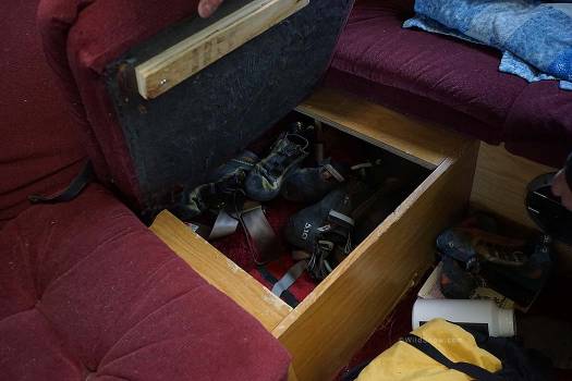 In the back of the ProVan, three compartments under the sitting area provide storage. A fourth compartment holds the water, approximately 20 gallons. In the back of the ProVan, three compartments under the sitting area provide storage. A fourth compartment holds the water, approximately 20 gallons.