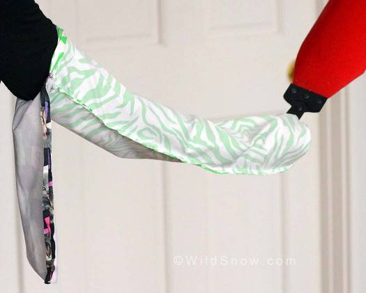 Turn the 24 inch tube inside out and insert your arm with the 10 inch tube hanging by your elbow. Grab the tail of the skin, glue side up. Turn the 24 inch tube inside out and insert your arm with the 10 inch tube hanging by your elbow. Grab the tail of the skin, glue side up.