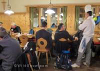 European uphilling scene. Mutterer Alm chef making sure his guests are happy.