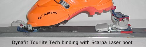 Time tested and reliable Dynafit TLT ski binding in touring mode with heel lift, brake installed and retracted for touring. 2001 model shown here, all are similar. Time tested and reliable Dynafit TLT ski binding in touring mode with heel lift, brake installed and retracted for touring. 2001 model shown here, all are similar.