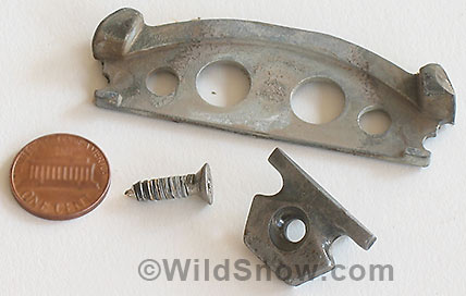 Dynafit toe and heel fittings removed from boot. Coin for scale. Total weight 1.1 ounces. Dynafit toe and heel fittings removed from boot. Coin for scale. Total weight 1.1 ounces.