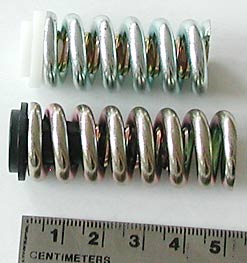 Naxo vertical release springs, photo is slightly distorted, older model at top measures 4 cm. Naxo vertical release springs, photo is slightly distorted, older model at top measures 4 cm.