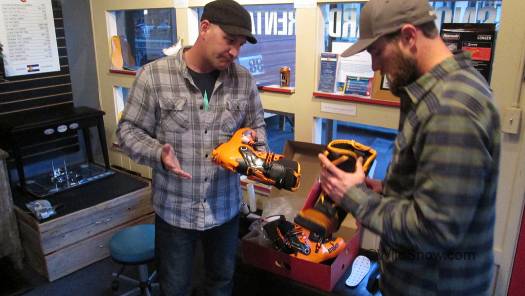 Randy Young (right) of our advertising partner Cripple Creek checks out the new shoes.