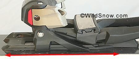 The binding plate slides for and aft by virtue of this track and flange system under the toe. The binding plate slides for and aft by virtue of this track and flange system under the toe.