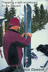 Splitboard skis up and rides down. Splitboard skis up and rides down.