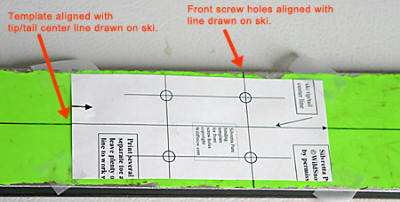 Front portion of paper template on ski. Template has been cut so it's slightly narrower than ski, but long enough to show plenty of the left/right center location line.