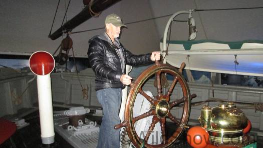 Myself at the helm. The ship propeller was mounted on a vertical shaft so it could be pulled up out of the water and ice. Myself at the helm. The ship propeller was mounted on a vertical shaft so it could be pulled up out of the water and ice.