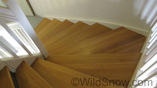 Just a staircase, but shows how the hotel interior is design themed with clear wood finishes and white walls.