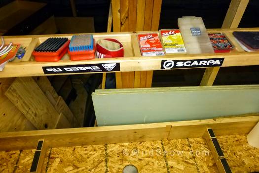 I added a top shelf basically just to mount a work light but subdivided it to stow waxing stuff. What you don't see is one of these partitions on the end is fitted with a sheet metal liner so I can throw hot Ptex in it. Overkill but what the heck. I added a top shelf basically just to mount a work light but subdivided it to stow waxing stuff. What you don't see is one of these partitions on the end is fitted with a sheet metal liner so I can throw hot Ptex in it. Overkill but what the heck.