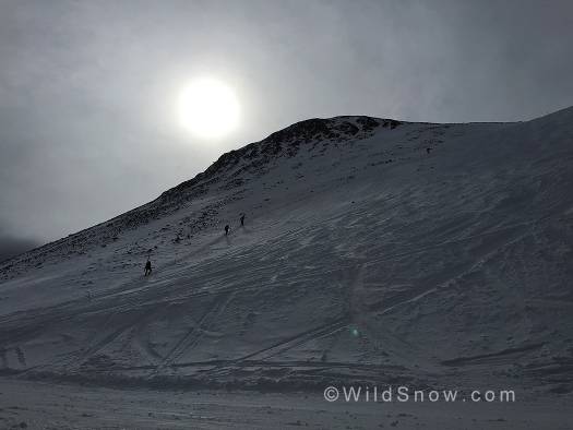 Skiers ascend out of Moonlight Basin.