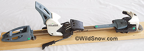 Complete Fritschi Diamir Titanal binding. The design revolution with this binding was in using a single lightweight rail to connect heel and toe units. This rail was ostensibly made from Titanal, a very strong aluminum alloy. Nonetheless the rail bent too easily and was strengthened in later models. In all, the binding was very lightweight and had a modern look and feel. Complete Fritschi Diamir Titanal binding. The design revolution with this binding was in using a single lightweight rail to connect heel and toe units. This rail was ostensibly made from Titanal, a very strong aluminum alloy. Nonetheless the rail bent too easily and was strengthened in later models. In all, the binding was very lightweight and had a modern look and feel.