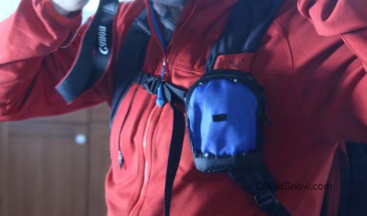 First, figure out where you can mount the bag for easiest access and least discomfort while moving arm in normal skiing motions. First, figure out where you can mount the bag for easiest access and least discomfort while moving arm in normal skiing motions.
