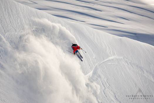 Louie-skiing-AK_wildsnow Having a great time ripping down an Alaskan face on the Spoons this last spring. These things excel in powder, especially at high speeds.