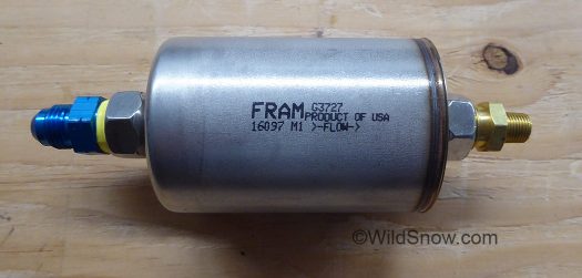 Fram with AN fitting on one end, brass flare on the other. Fram with AN fitting on one end, brass flare on the other.