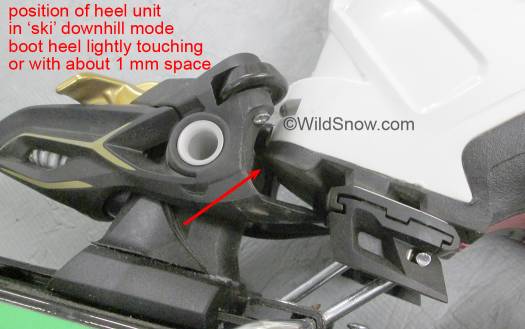 With boot attached to ski at the toe unit, slide the heel unit up to the boot heel and mark the screw positions. 