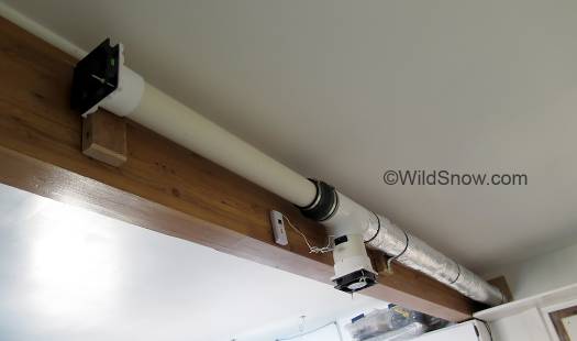 Completed heat exchanger located near ceiling in office workshop. Completed heat exchanger located near ceiling in office workshop.