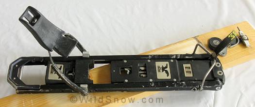 In a lateral release, the binding pivots and looks as above, though it may pull up and off the center stub as well. Re-assembling the binding after a release can be frustrating but is doable. In a lateral release, the binding pivots and looks as above, though it may pull up and off the center stub as well. Re-assembling the binding after a release can be frustrating but is doable.