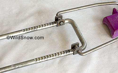 Length adjustment for boots is done by moving the heel latch yoke along this notched bar. Elegant. Length adjustment for boots is done by moving the heel latch yoke along this notched bar. Elegant.