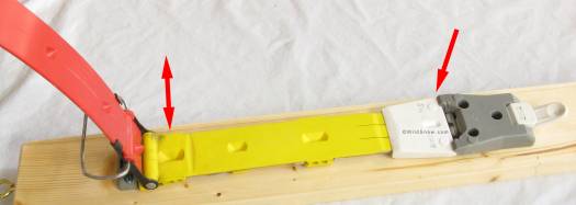 Plate system with pivot plate lifted to left. When removed due to release or other, Yellow anchor plate snaps in via tabs and ramps indicated by right arrow. Plate system with pivot plate lifted to left. When removed due to release or other, Yellow anchor plate snaps in via tabs and ramps indicated by right arrow.
