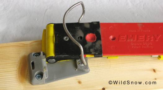 Rotational release at both plates coming completely off the ski. To prevent ski loss a retention cord could be added using the slot visible at extreme left. Rotational release at both plates coming completely off the ski. To prevent ski loss a retention cord could be added using the slot visible at extreme left.