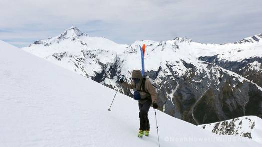 Beau near the summit with yesterdays Mount Aspiring in the background. The French Ridge Hut is in there somewhere on the right hand ridge.