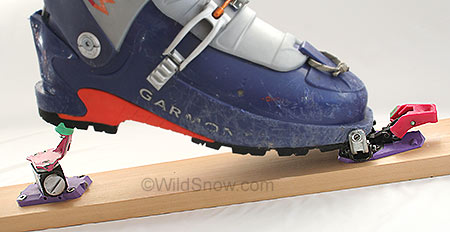 Complete 1993 Dynafit Tourlite Tech backcountry skiing binding shown above. The pink and purple color scheme is typical of late 1980s and early 1990s style. Complete 1993 Dynafit Tourlite Tech backcountry skiing binding shown above. The pink and purple color scheme is typical of late 1980s and early 1990s style.