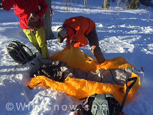 Use victim's pack and extra gear to pad sled bottom for comfort. Recommendation for remote travel: bring a small ThermoRest. It adds a lot of comfort in a bivvy or long evacuation. Use victim's pack and extra gear to pad sled bottom for comfort. Recommendation for remote travel: bring a small ThermoRest. It adds a lot of comfort in a bivvy or long evacuation.