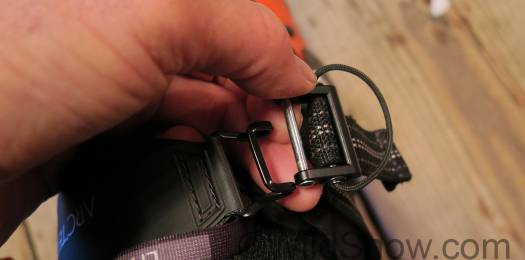 Power strap is quite nice. It tightens up and locks without velcro, is easy to loosen for the uphill, and easy to completly unlatch using the hook and bar shown here. Power strap is quite nice. It tightens up and locks without velcro, is easy to loosen for the uphill, and easy to completly unlatch using the hook and bar shown here.