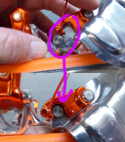 G3 ski crampons attach with a pin and hook arrangement. Appears a bit complex, but works beautifully. G3 ski crampons attach with a pin and hook arrangement. Appears a bit complex, but works beautifully.