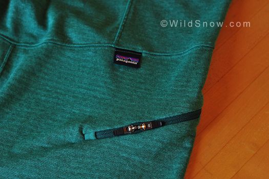 Flush zipper tabs -- The drop-seat zipper-pulls snap down to lay flat against the zipper. This creates a clean finish that won't catch on other layers. Flush zipper tabs -- The drop-seat zipper-pulls snap down to lay flat against the zipper. This creates a clean finish that won't catch on other layers.