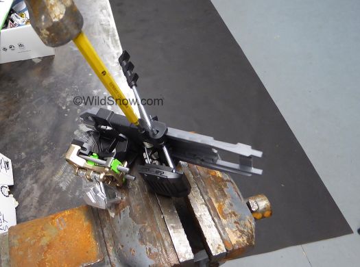 Hammer and pin punch remove main axle. Hammer and pin punch remove main axle.