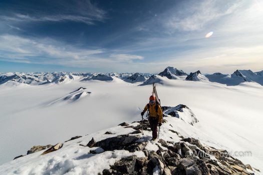 WildsnowEdit (20 of 28) Eric nearing the top of Mt. Dagon. The larger part of the Monarch icefield stretches out behind him.