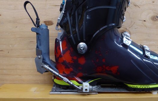 Binding heel latched down to ski for downhill mode. Look Nevada sourced binding heel appears to be a plastic housed version of the Look N77, or perhaps a repurposed rental binding. It's quite nicely made and still functions perfectly, though I kept release tension minimal to avoid shrapnel in the event the 40 year old plastic has weakened. Binding heel latched down to ski for downhill mode. Look Nevada sourced binding heel appears to be a plastic housed version of the Look N77, or perhaps a repurposed rental binding. It's quite nicely made and still functions perfectly, though I kept release tension minimal to avoid shrapnel in the event the 40 year old plastic has weakened.