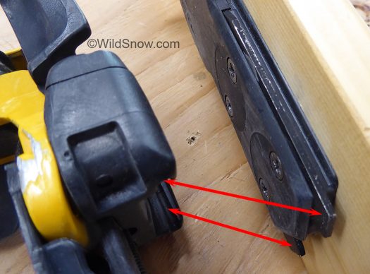 Fixed heel downhill latching system, simply blade-like parts on ski mate with slots under plate at heel. Fixed heel downhill latching system, simply blade-like parts on ski mate with slots under plate at heel.