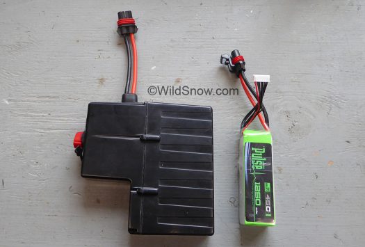 Arcteryx Voltair OEM battery to left at 774 grams, experimental LiPo 1250 mAh to right only weighs 250 grams and easily powers several balloon inflations at higher temperatures, but probably doesn't have enough excess power for redundant safety and cold weather performance. Arcteryx Voltair OEM battery to left, LiPo 1250 mAh 45C battery to right.
