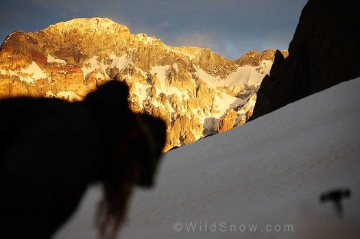 Sole preps her pack for the next day while the last rays of sun illuminate Cerro Marmolejo's west wall. Sole preps her pack for the next day while the last rays of sun illuminate Cerro Marmolejo's west wall.