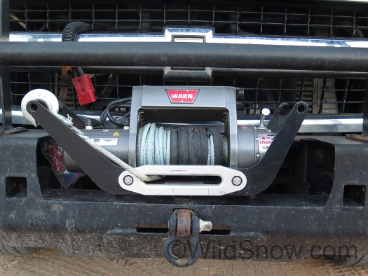 Warn winch mounts on a customized 2 inch receiver attached to our front bumper, it easily comes off and mounts on rear trailer hitch so we can recover backwards. Warn winch mounts on a customized 2 inch receiver attached to our front bumper, it easily comes off and mounts on rear trailer hitch so we can recover backwards.