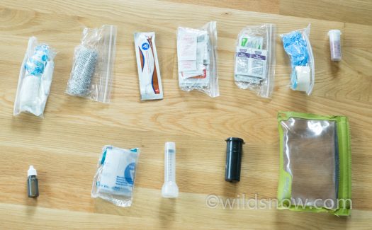 DSC05692 My updated first aid kit, with all the items stored in small ziploc bags. The bag that holds the kit is visible in the lower right as well.