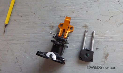 We just happened to have a damaged pre-retail Atomic MTN binding here, shown here with lifter pin driven part way out and the length adjuster ground off. We just happened to have a damaged pre-retail Atomic MTN binding heel unite here at WildSnow HQ, shown here with lifter pin driven part way out and the length adjuster ground off.