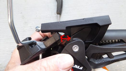 Slip the brake unit onto the binding heel unit, so the two plastic prongs made with the plastic tabs. Slip the brake unit onto the binding heel unit, so the two plastic prongs made with the plastic tabs.